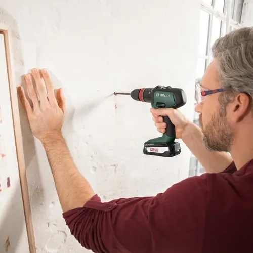 Bosch AdvancedImpact 18 Set аккумуляторная ударная дрель-шуруповерт (2 x 2.5 Ач, ЗУ) с набором насадок, 06039B5103